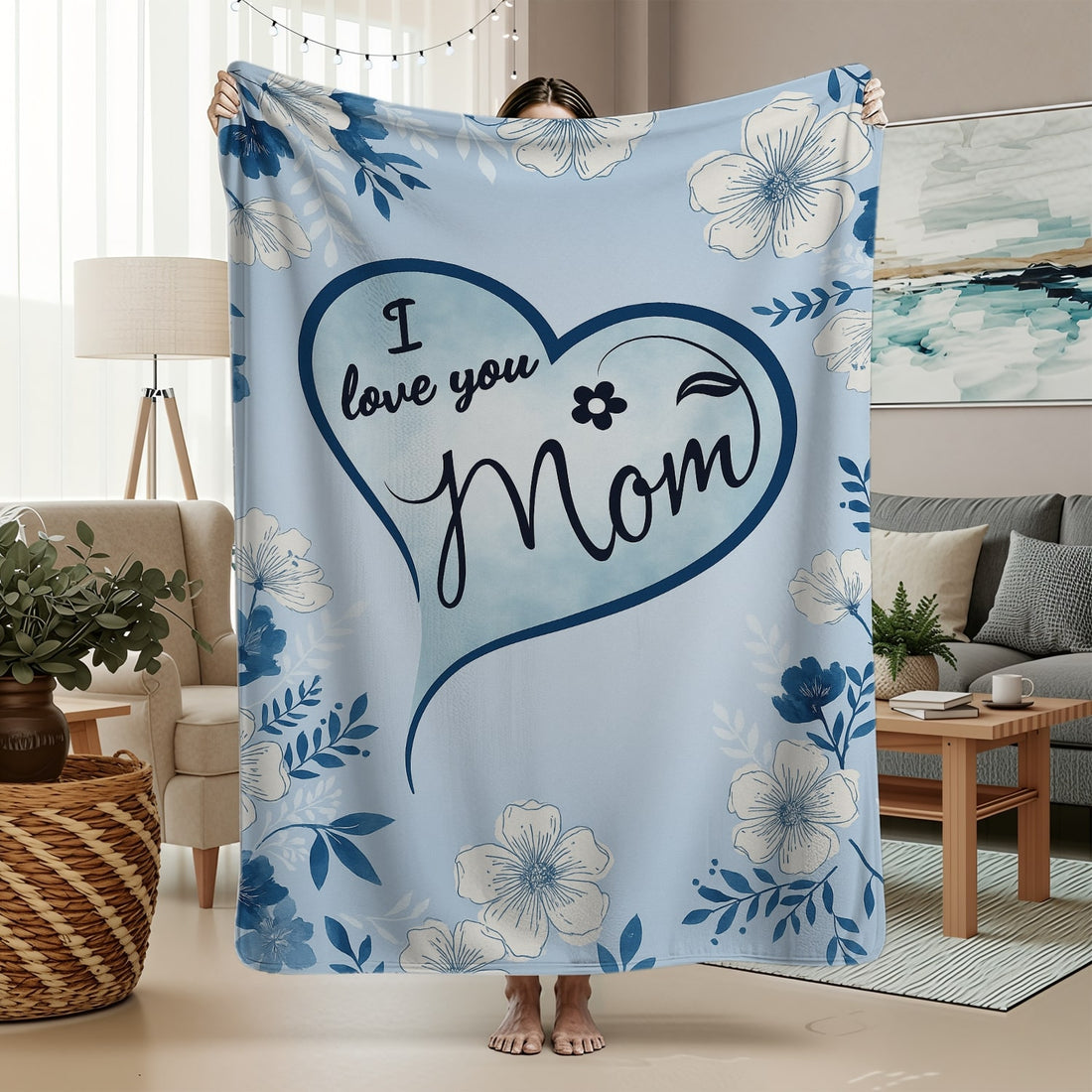 Blue floral mom blanket with heart design and loving message in a cozy living room — Discover heartfelt personal gifts at HerTender.com