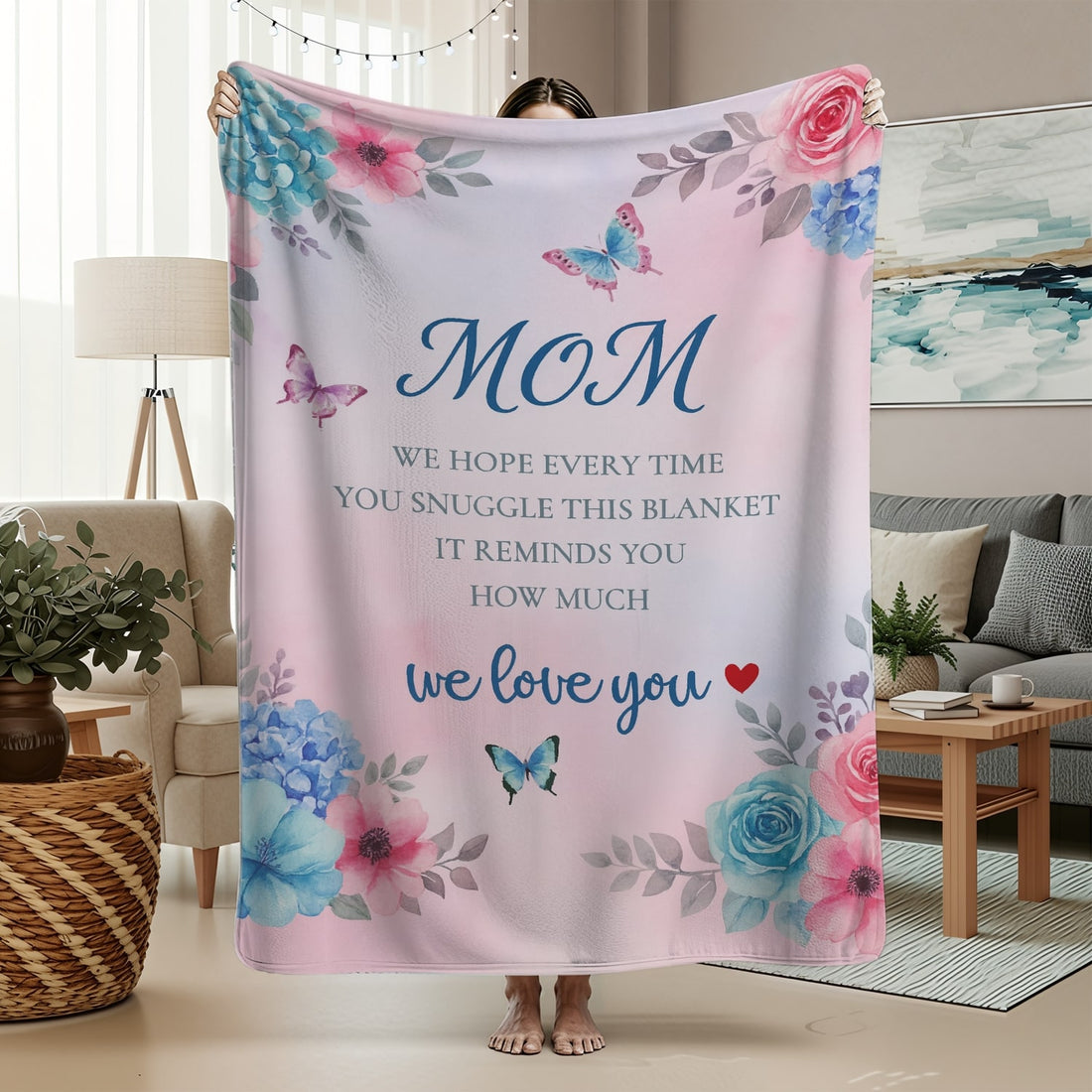 Pastel floral mom blanket with butterflies and loving message draped over a cozy sofa — Discover heartfelt personal gifts at HerTender.com