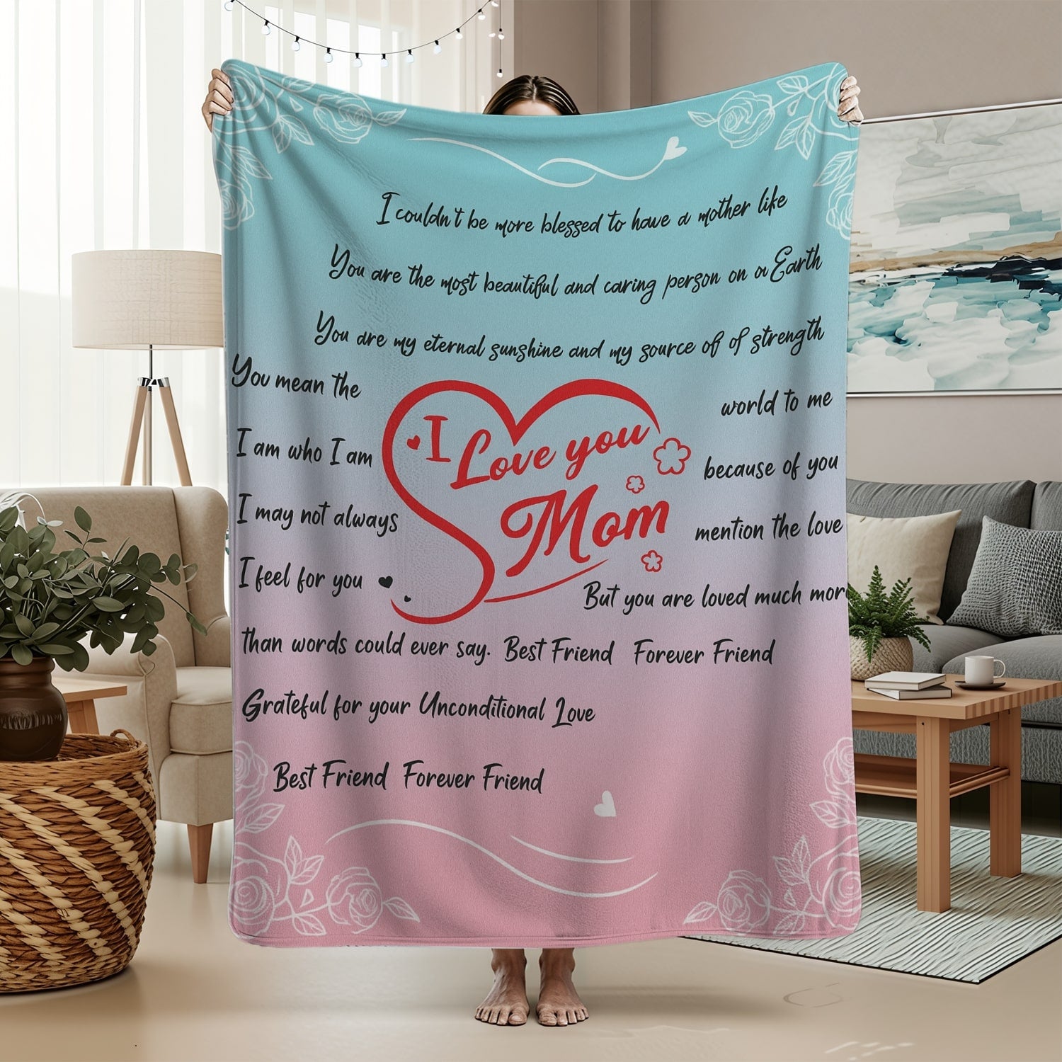Pastel pink and blue mom blanket with heartfelt message and red heart design in a cozy living room — Discover heartfelt personal gifts at HerTender.com