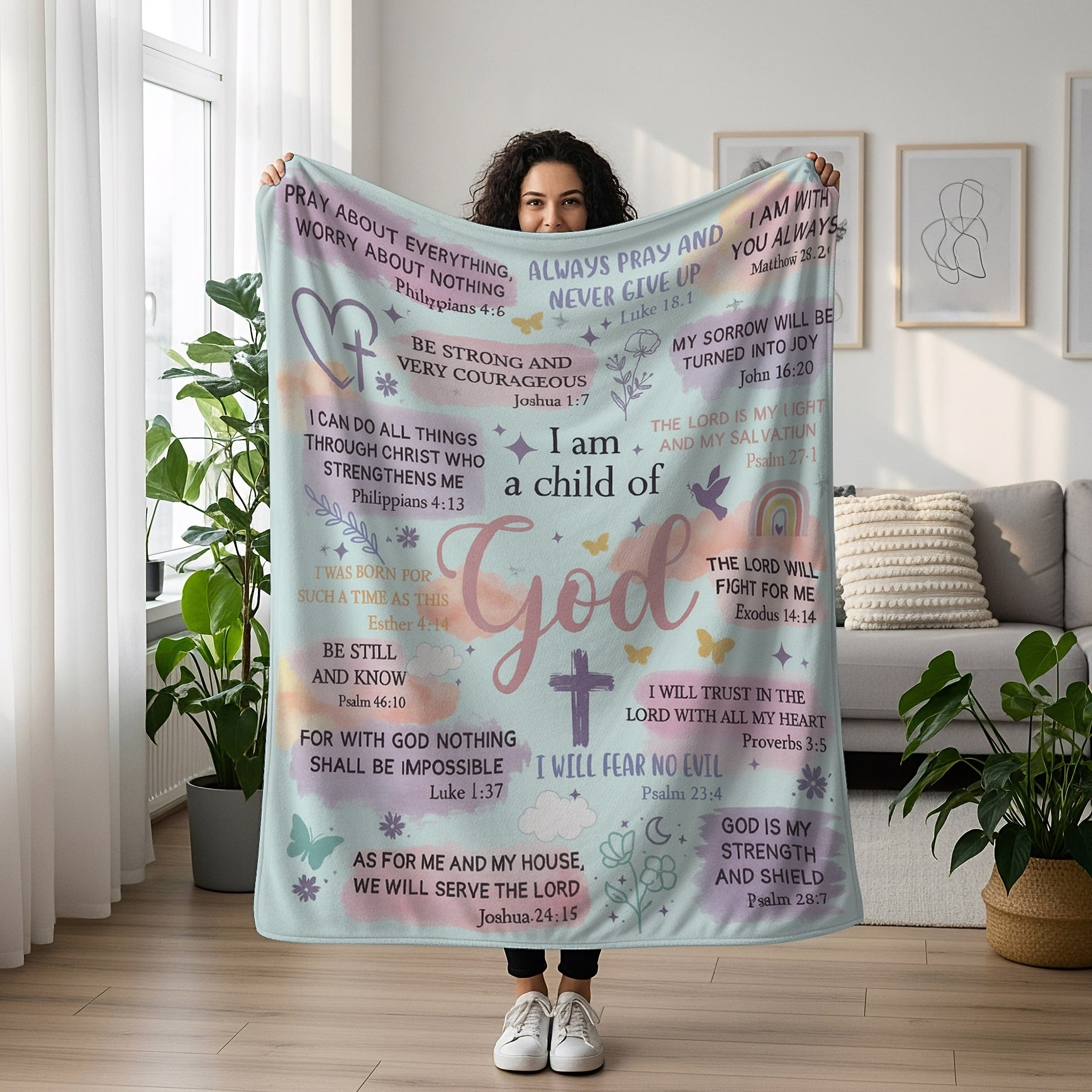 Woman holding a pastel blanket with Bible verses and the phrase “I am a child of God,” symbolizing faith-inspired personalized gifts — Discover heartfelt personalized gifts at HerTender.com.