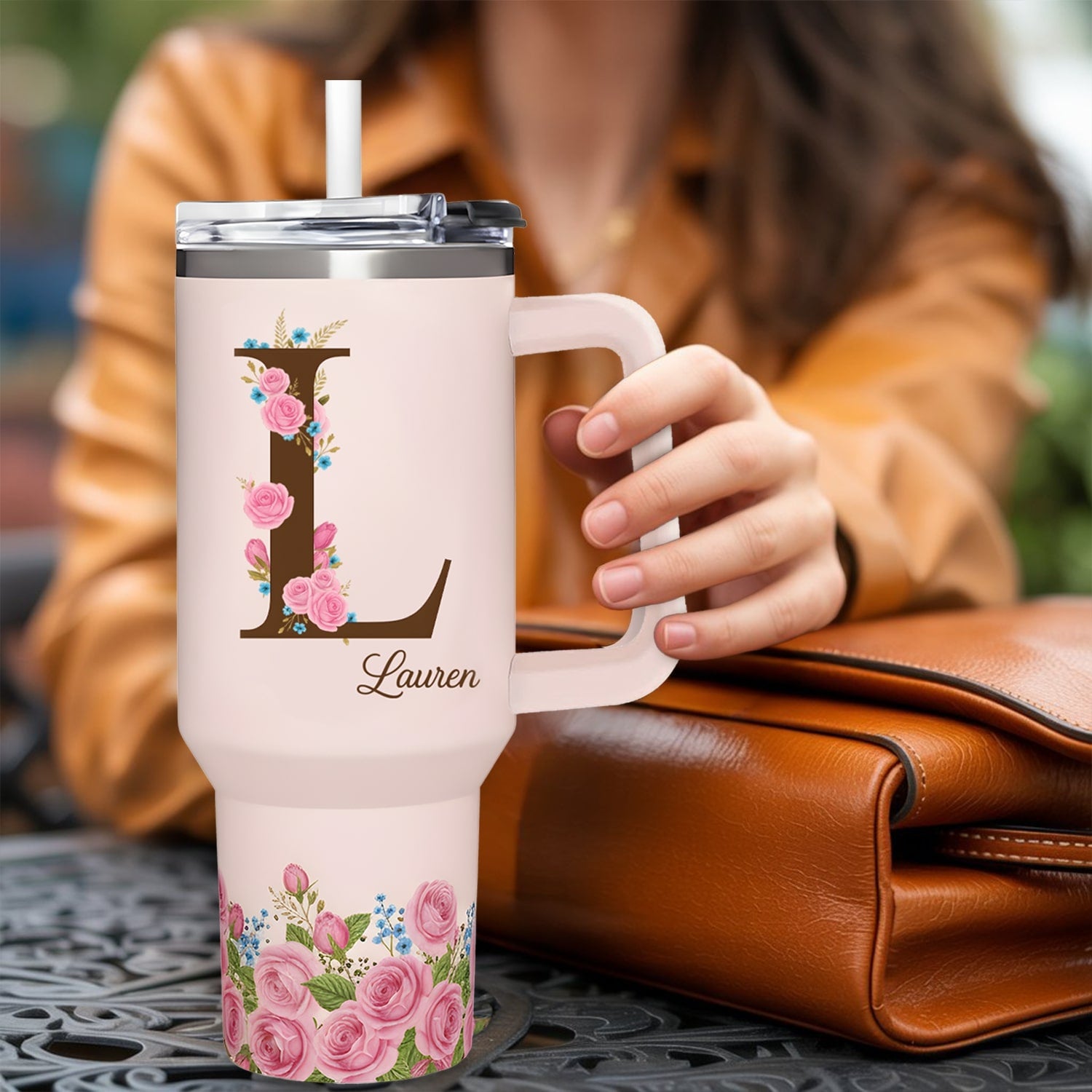 Elegant floral tumbler personalized with letter “L” and name Lauren — a chic and heartfelt Personalized Gift from HerTender.com, perfect for her daily coffee moments.