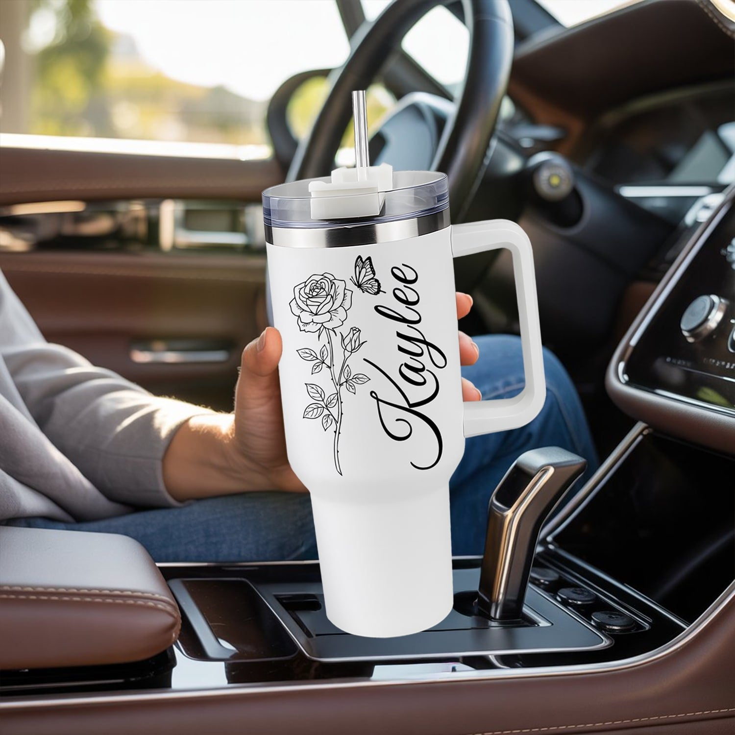 Elegant personalized tumbler with rose and butterfly art and name Kaylee — a beautiful Personalized Gift from HerTender.com for women who love style on the go.