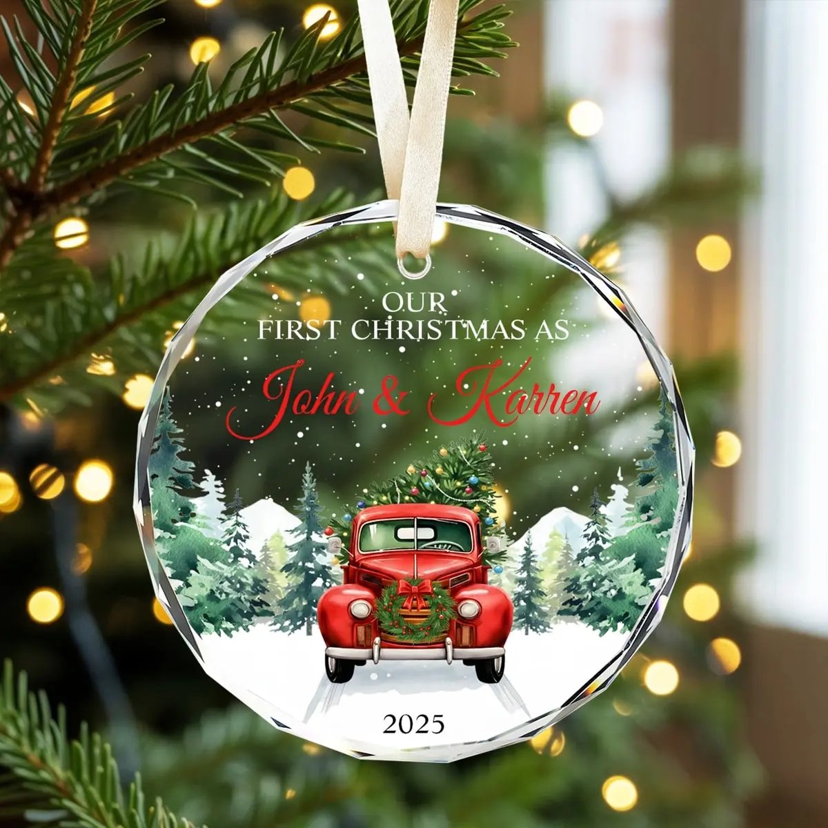 Round personalized glass ornament featuring a red vintage truck and snowy forest scene with text “Our First Christmas As John and Karren 2025” — a heartfelt keepsake for newlyweds, available at HerTender.com.
