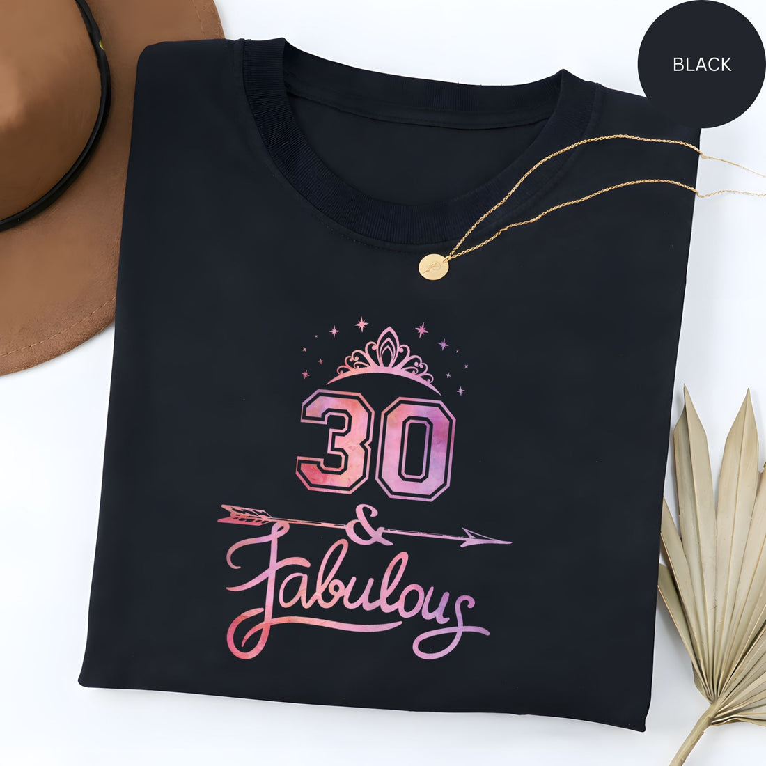 Black “30 & Fabulous” tee with pink gradient design and tiara. Shop Hertender at hertender.com.