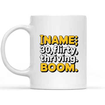 White mug reading “Name: 30, flirty, thriving. Boom.”, a fun and confident 30th birthday gift for your girlfriend that celebrates her personality and milestone year with attitude.