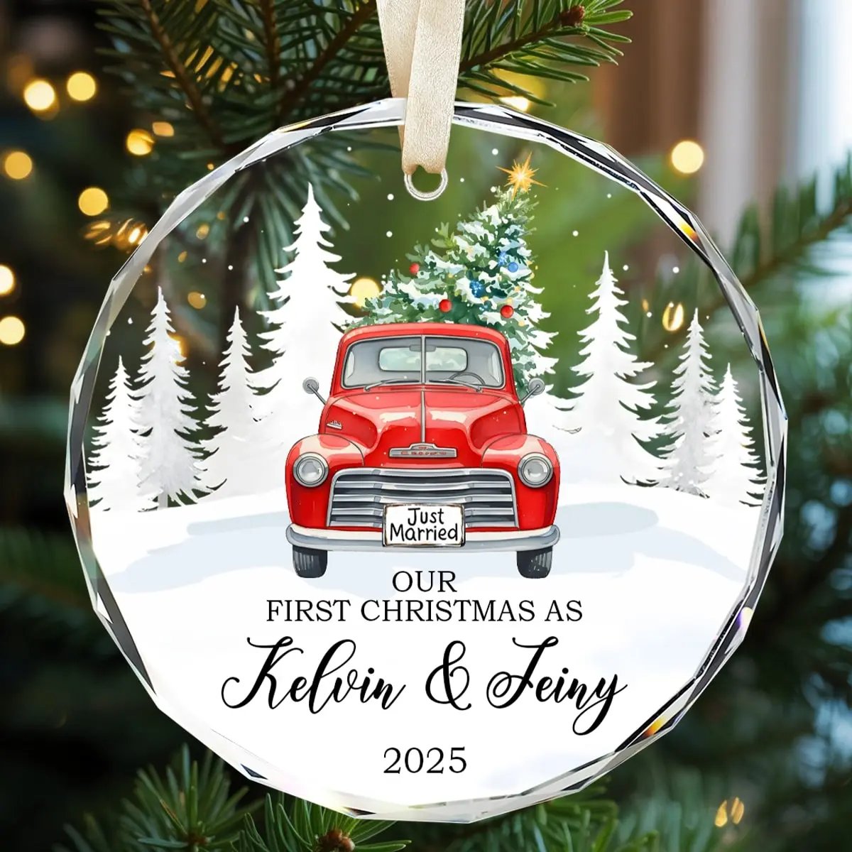 Round personalized glass ornament with a red vintage truck and “Just Married” plate, featuring the text “Our First Christmas As Kelvin and Jeiny 2025” — a romantic keepsake for newlyweds, available at Hertender.com.