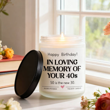 Personalized funny birthday candle for milestone age gift in cozy setting — Discover meaningful gifts at Hertender.com.