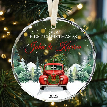 Round glass ornament featuring a red vintage truck with a Christmas tree and the text “Our First Christmas As John and Karren 2025” — A cozy keepsake celebrating your first Christmas together, available at Hertender.com.